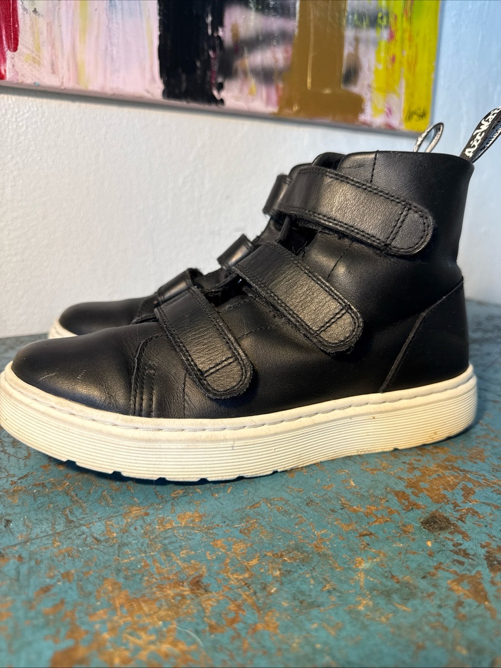 Dr. Martens Black Leather High-Top Booties with White Platform Sole